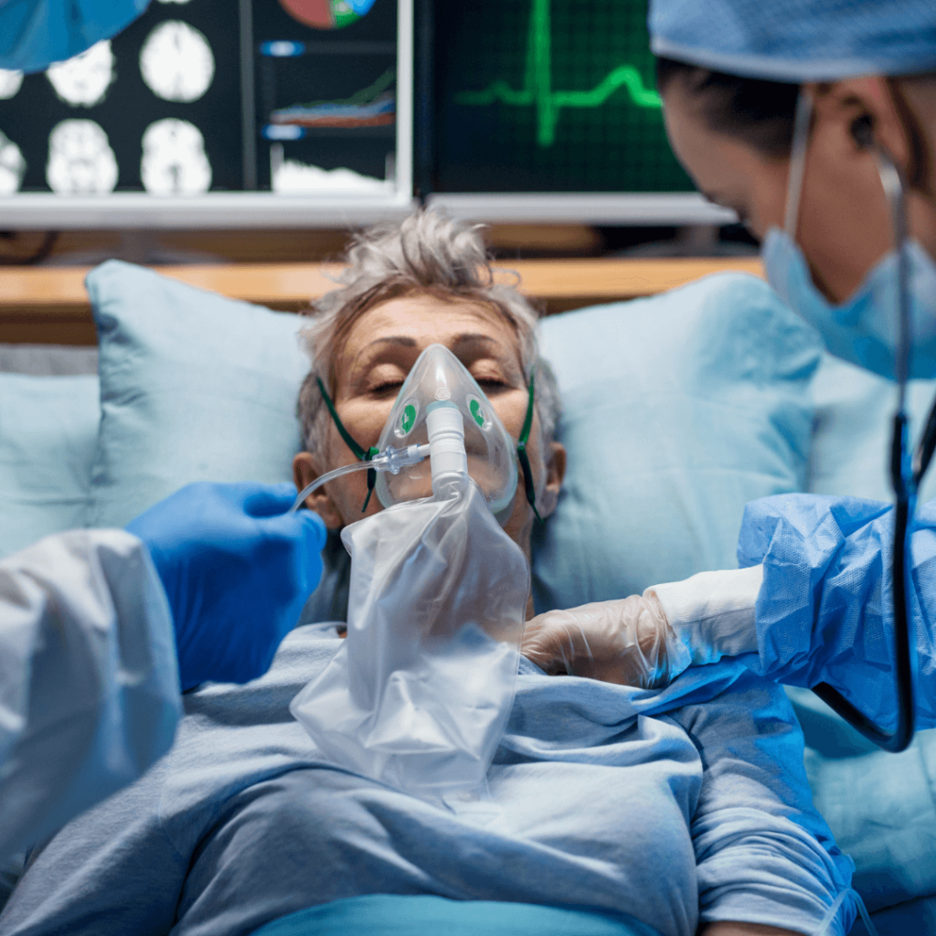 pacjentka na łóżku szpitalnym z maseczką tlenową Tłumaczenia medyczne z języka niemieckiego - dogadamycie.pl